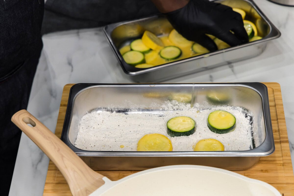 zucchini and yellow squash dipped in flour mixture