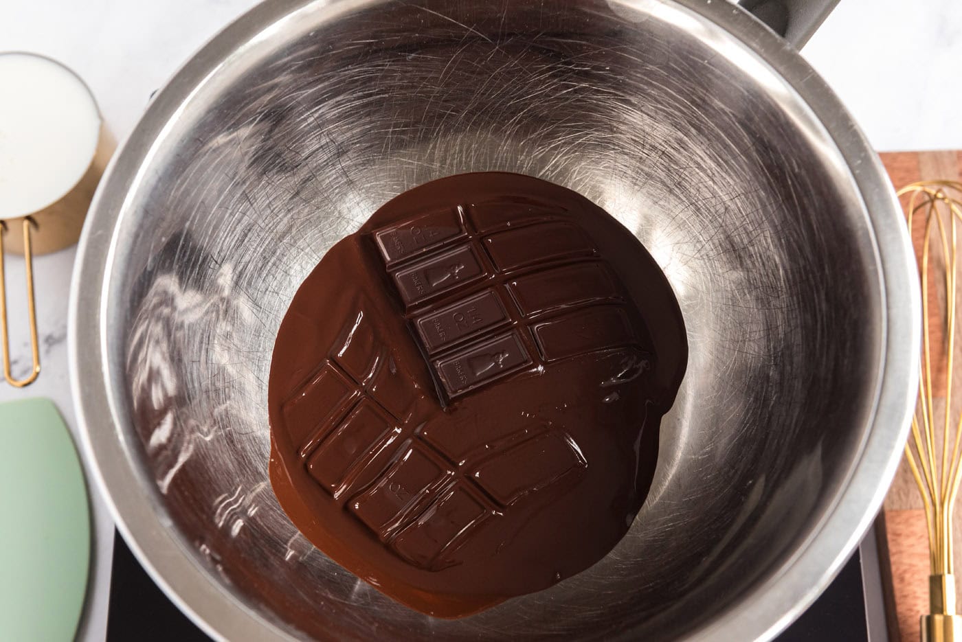 melting chocolate bars in a bowl over hot water