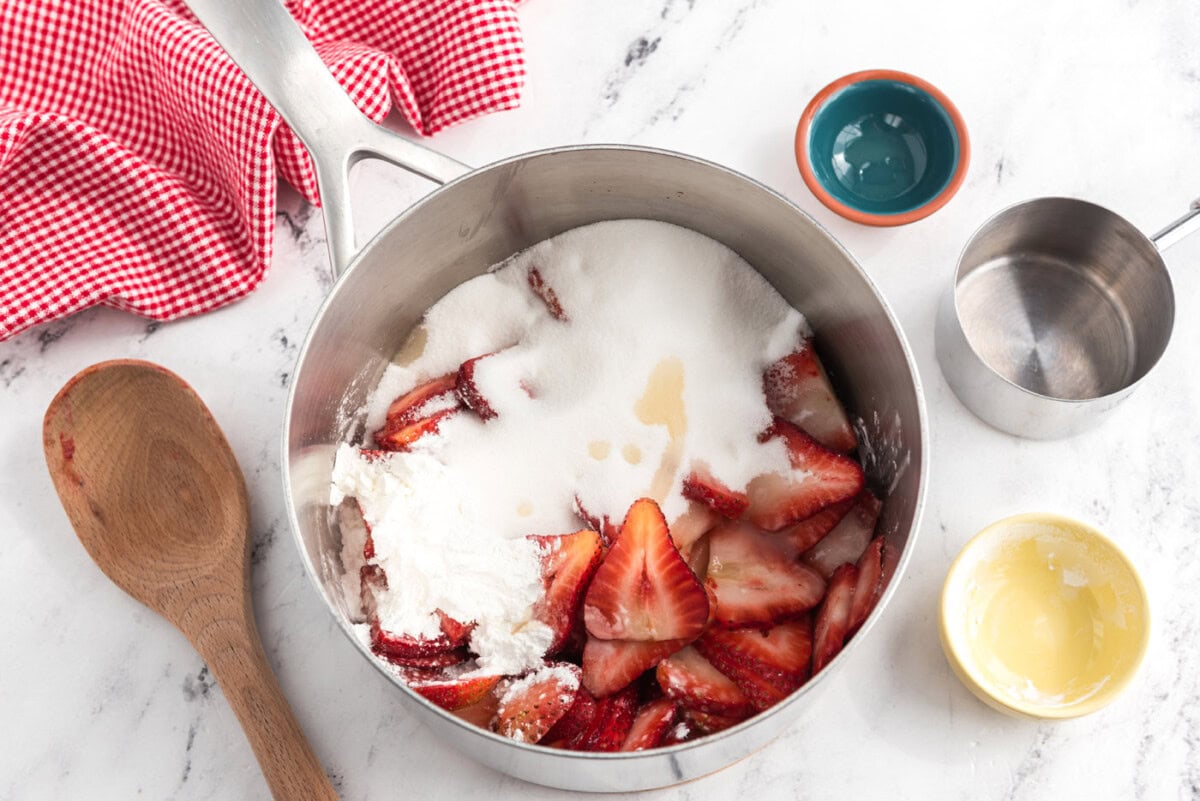 sugar, strawberries, and cornstarch in a saucepan