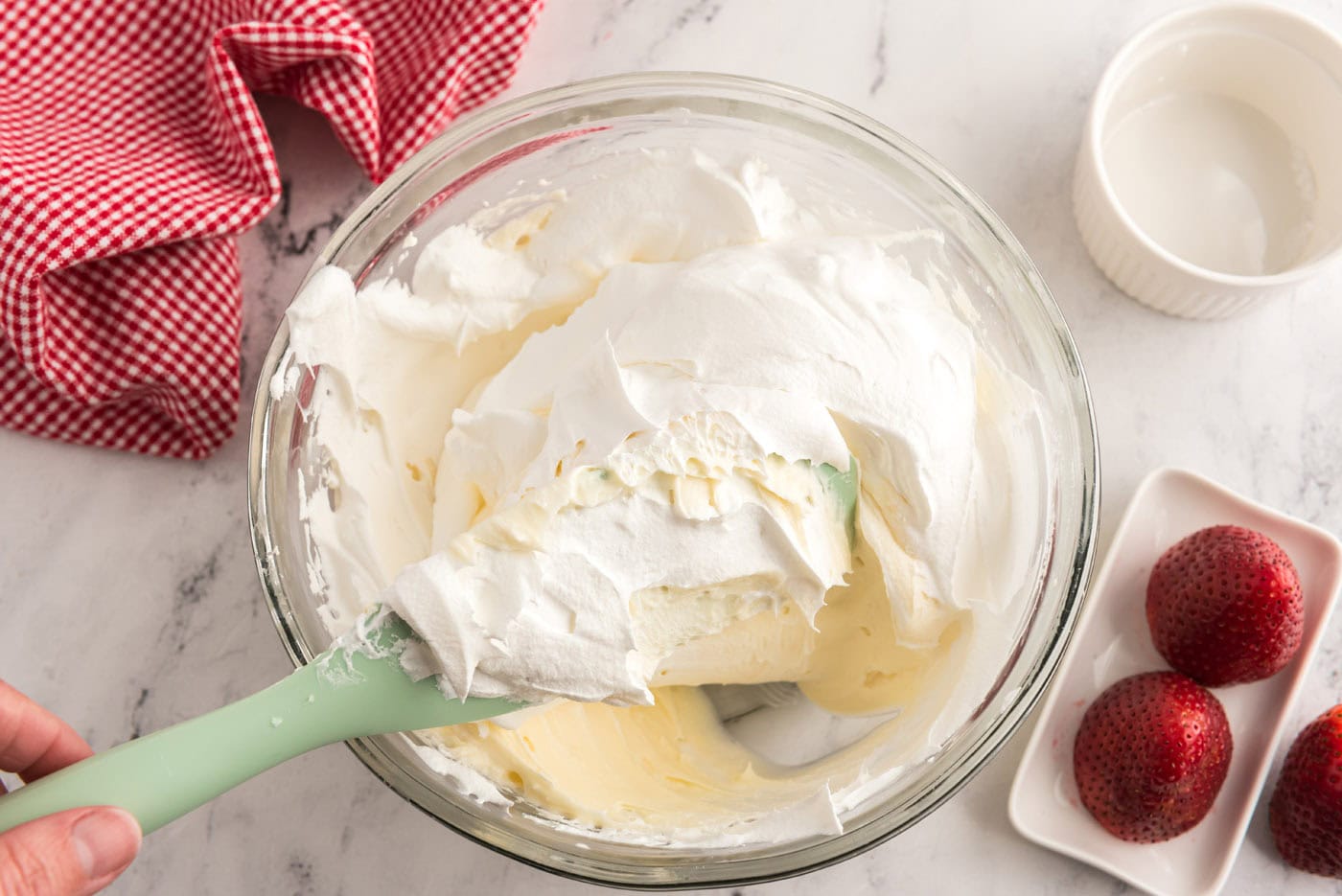 folding cool whip into cream cheese mixture