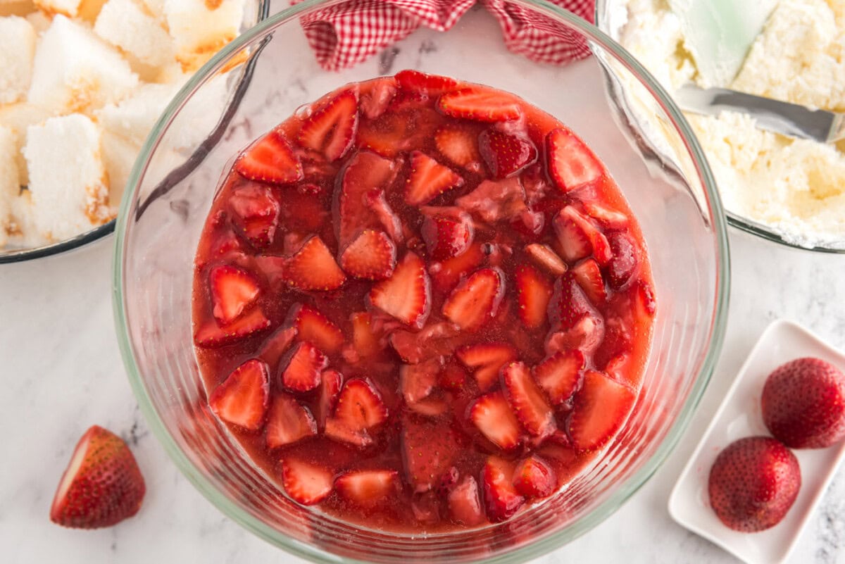 layer of macerated strawberries on top of cream cheese layer