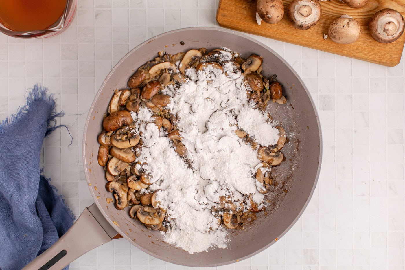 flour added to skillet with sauteed onion and mushrooms