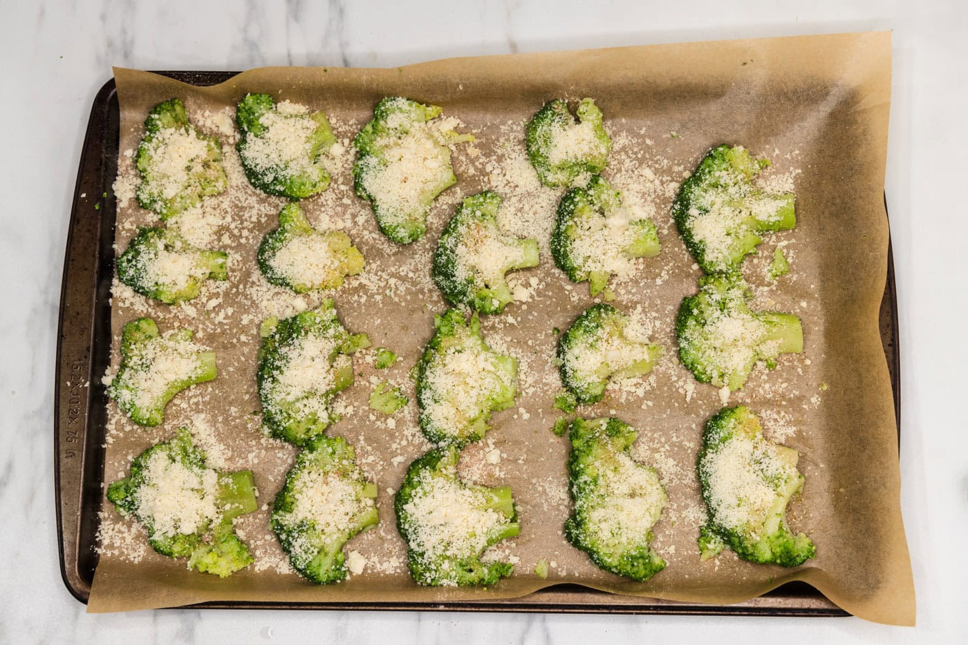 smashed broccoli florets with parmesan cheese