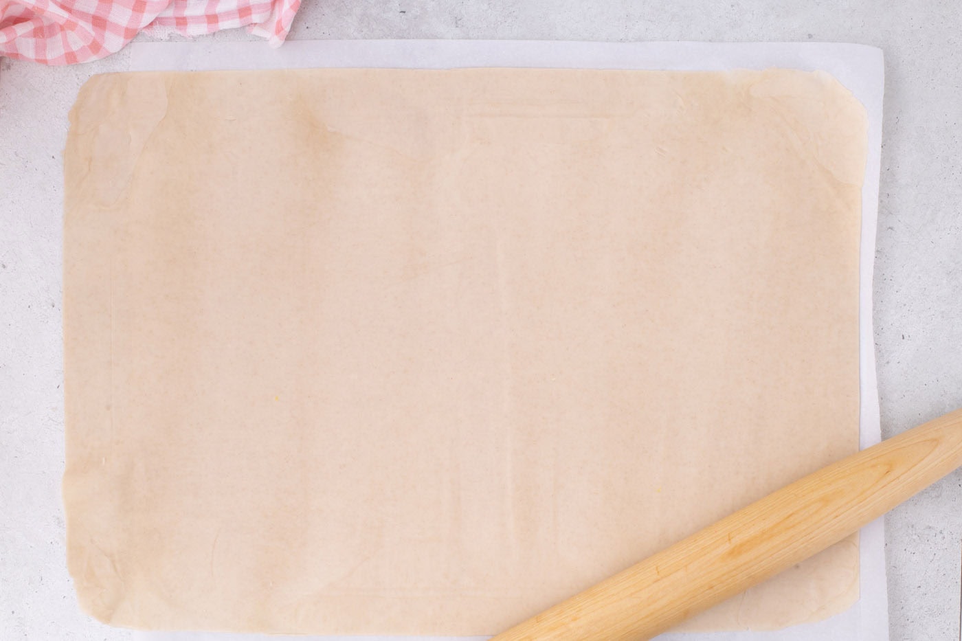 slab pie crust with a rolling pin