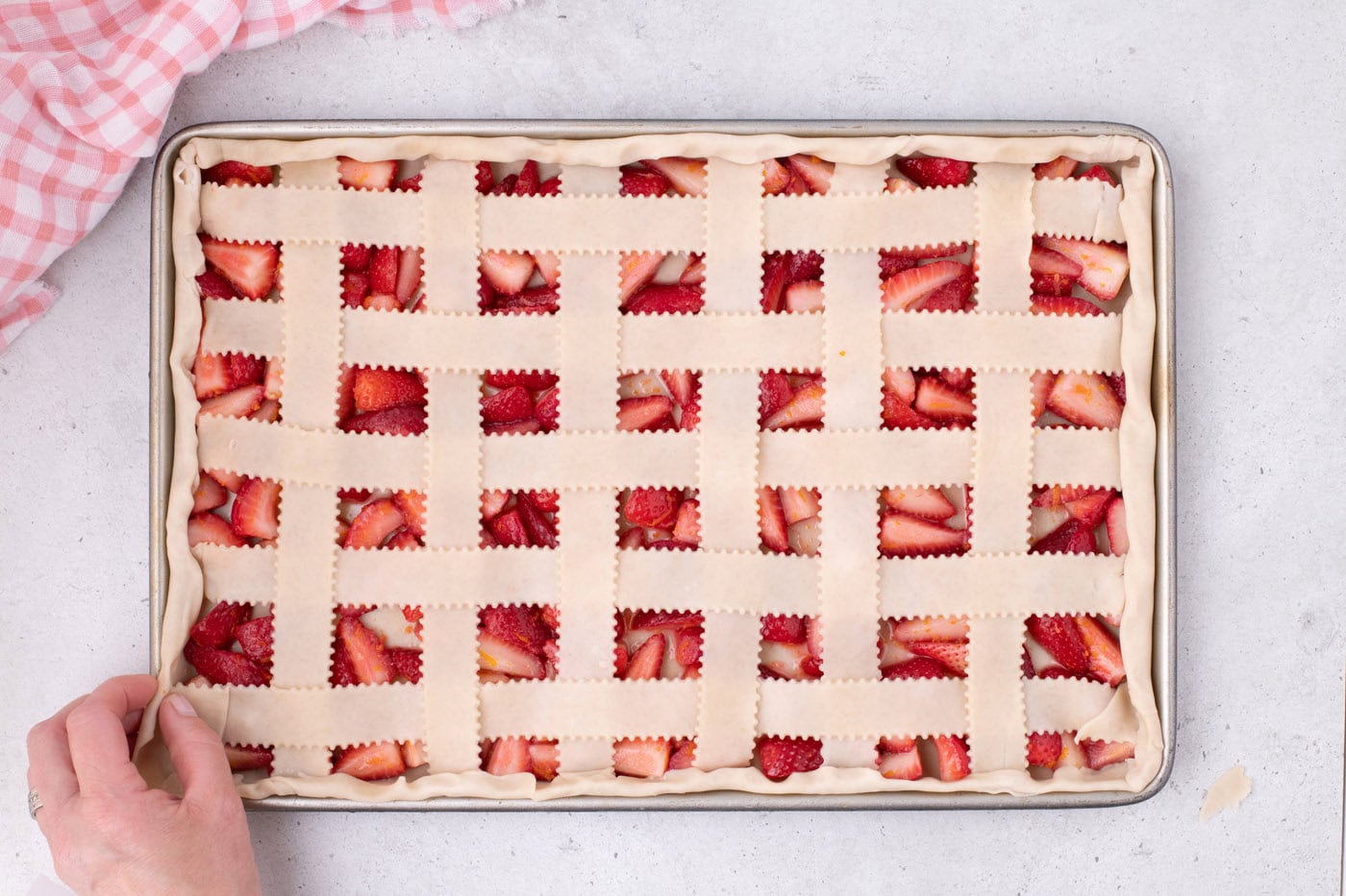 strawberry slab pie with a lattice top