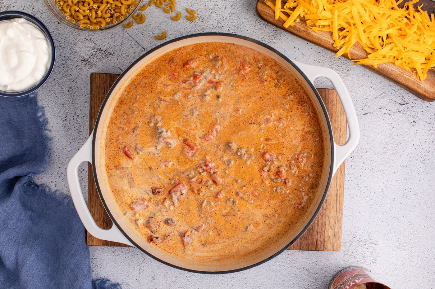 taco macaroni and cheese bubbling in a skillet