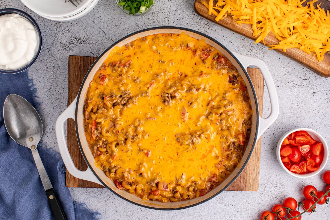 overhead shot of taco mac in a skillet covered with cheese