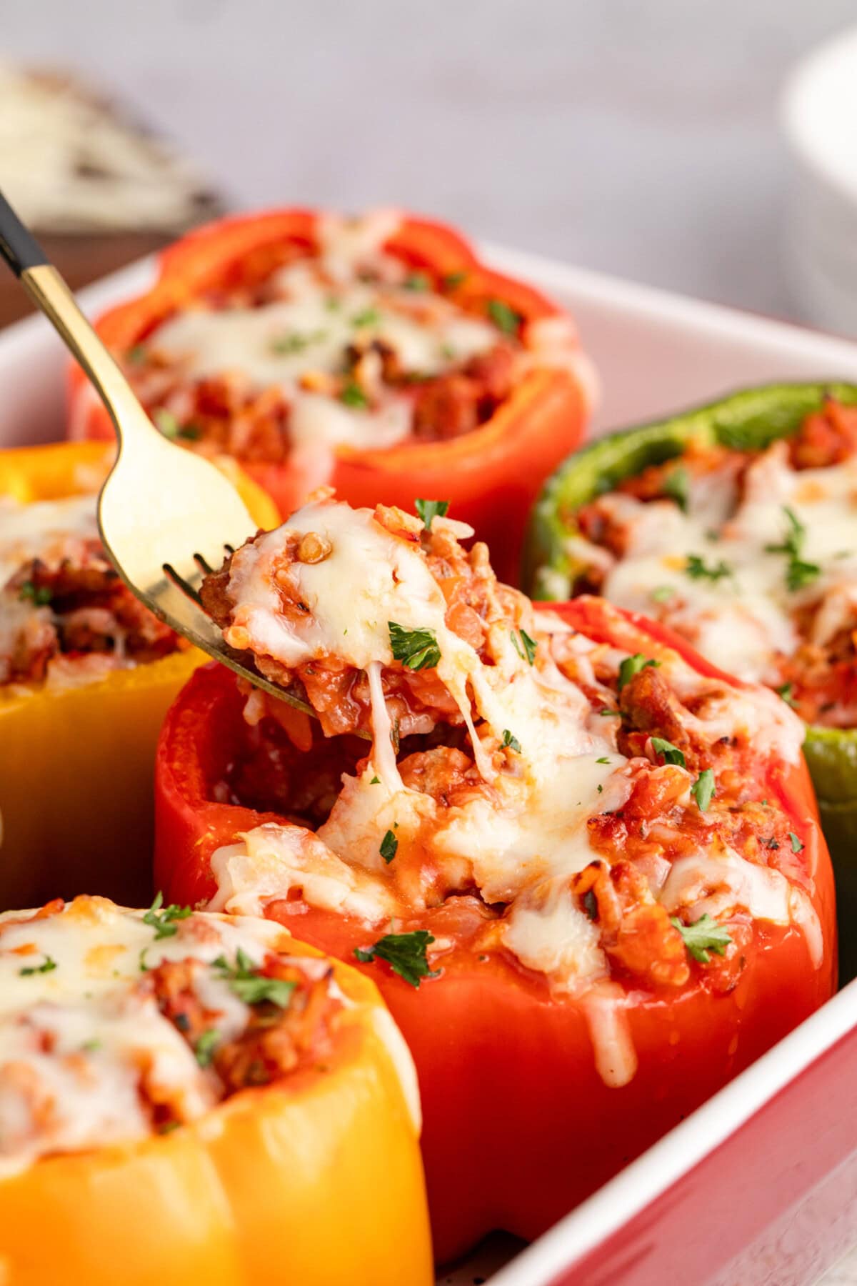 Fork picking up filling from a Turkey Stuffed Pepper