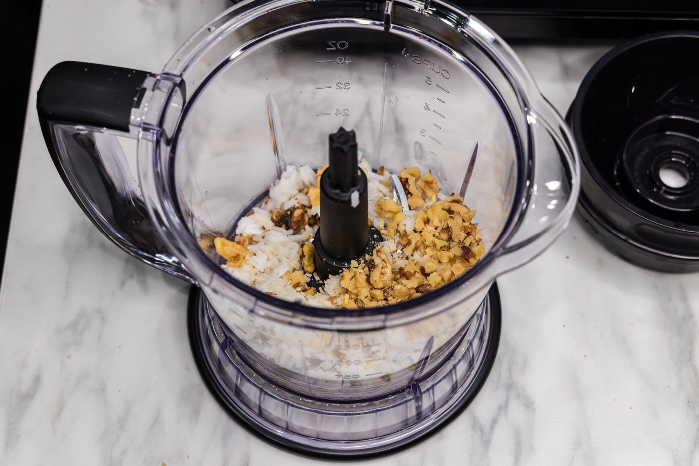 rice and walnuts added to a food processor