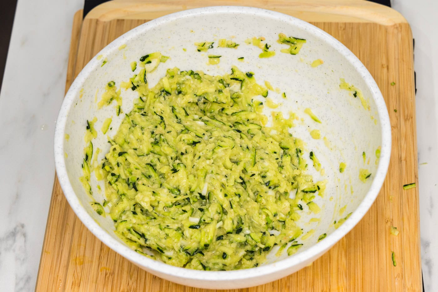 zucchini fritter mixture in a bowl