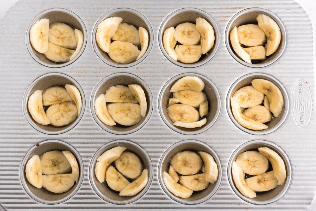 banana sliced in a muffin pan
