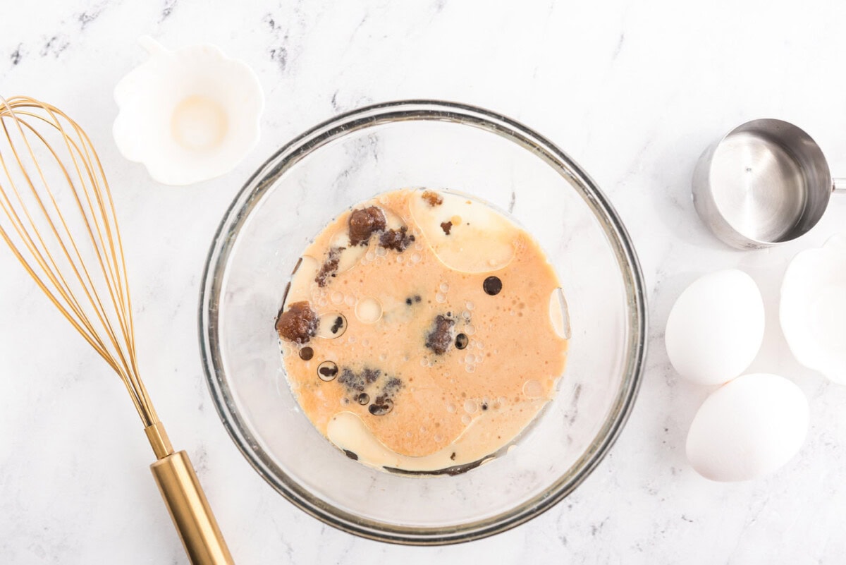 brown sugar, oil, milk, and rum in a bowl