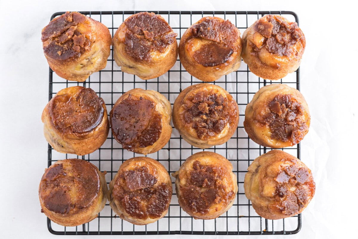 banana upside down muffins on a cooling rack
