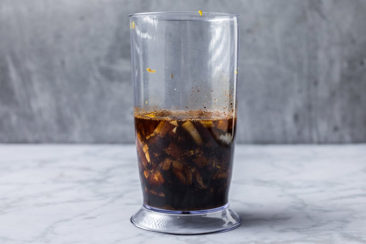 brown sugar bourbon marinade ingredients in an immersion blender