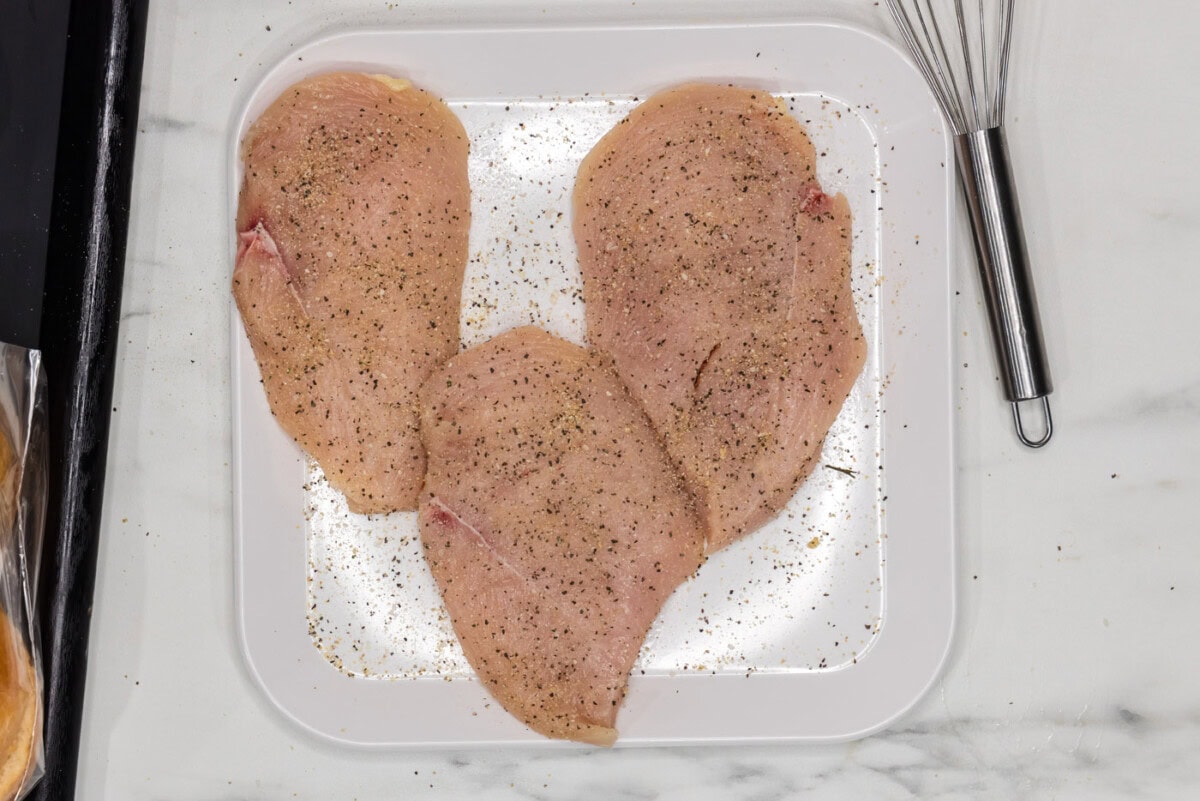 seasoned chicken breasts on a plate