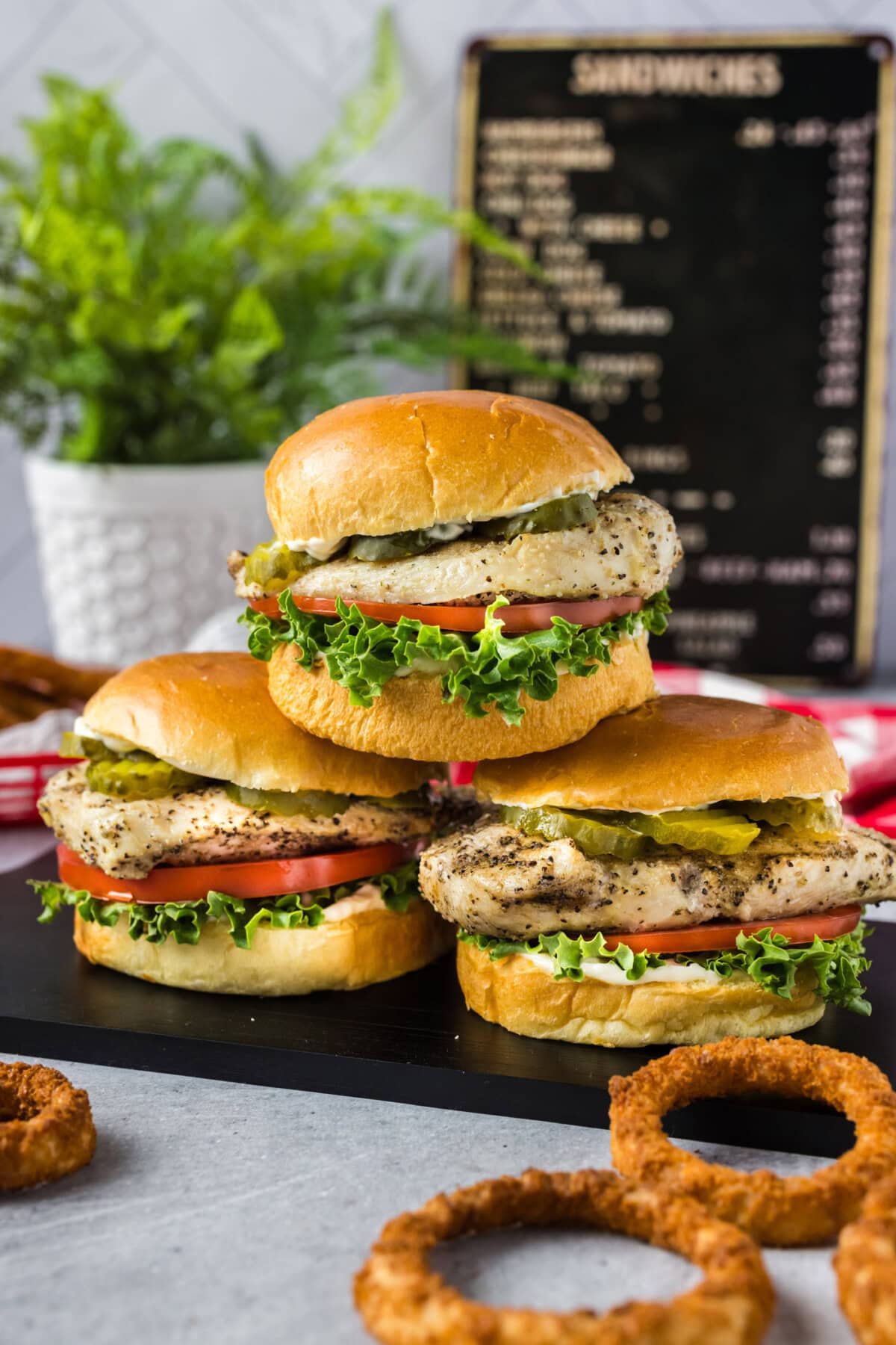 Three Chicken Sandwiches stacked on top of each other