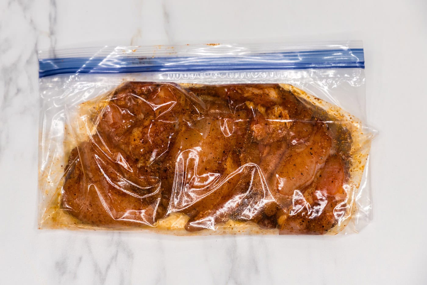 marinating chicken in a plastic bag