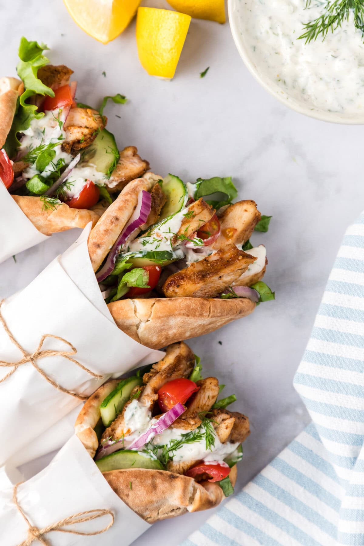 Chicken Shawarma in pita bread with veggies and tzatziki 