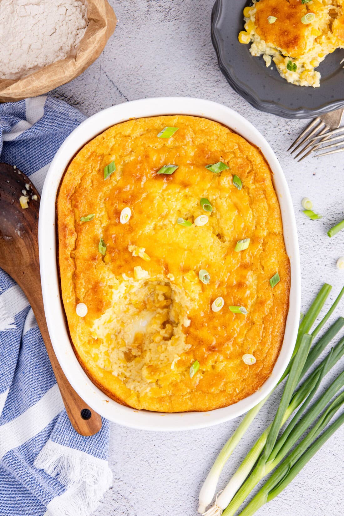 Corn Pudding in a baking dish with a serving removed