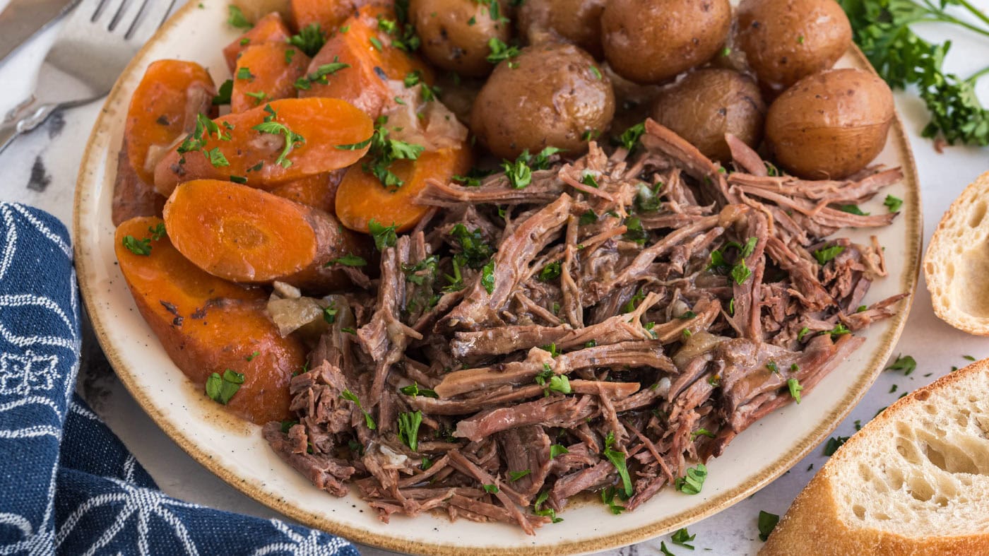 The Best Ever Crockpot Roast Beef - Amanda's Cookin'