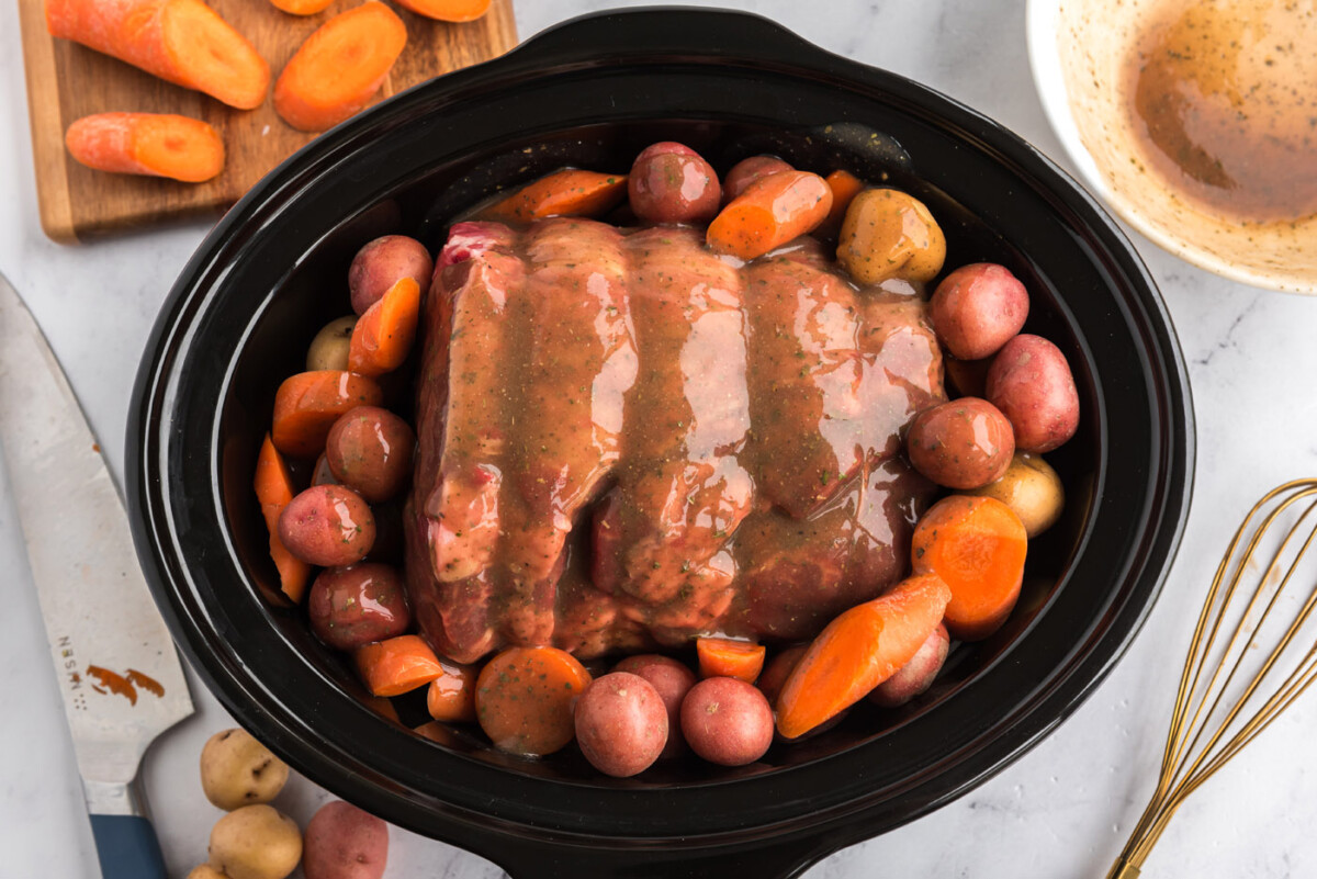 gravy poured over crockpot roast beef