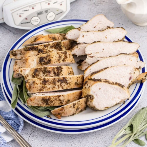 sliced cooked turkey breast on a plate