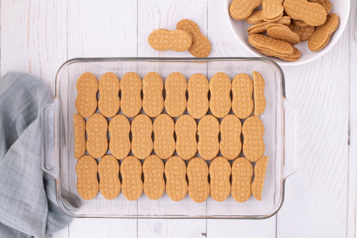 nutter butter cookies lined in a baking dish