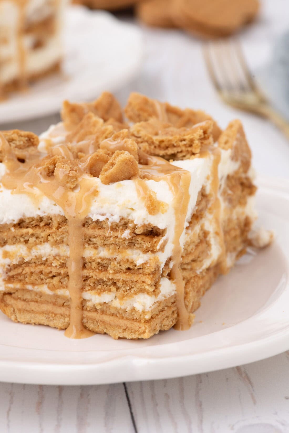 Close up photo of a slice of Nutter Butter Icebox Cake
