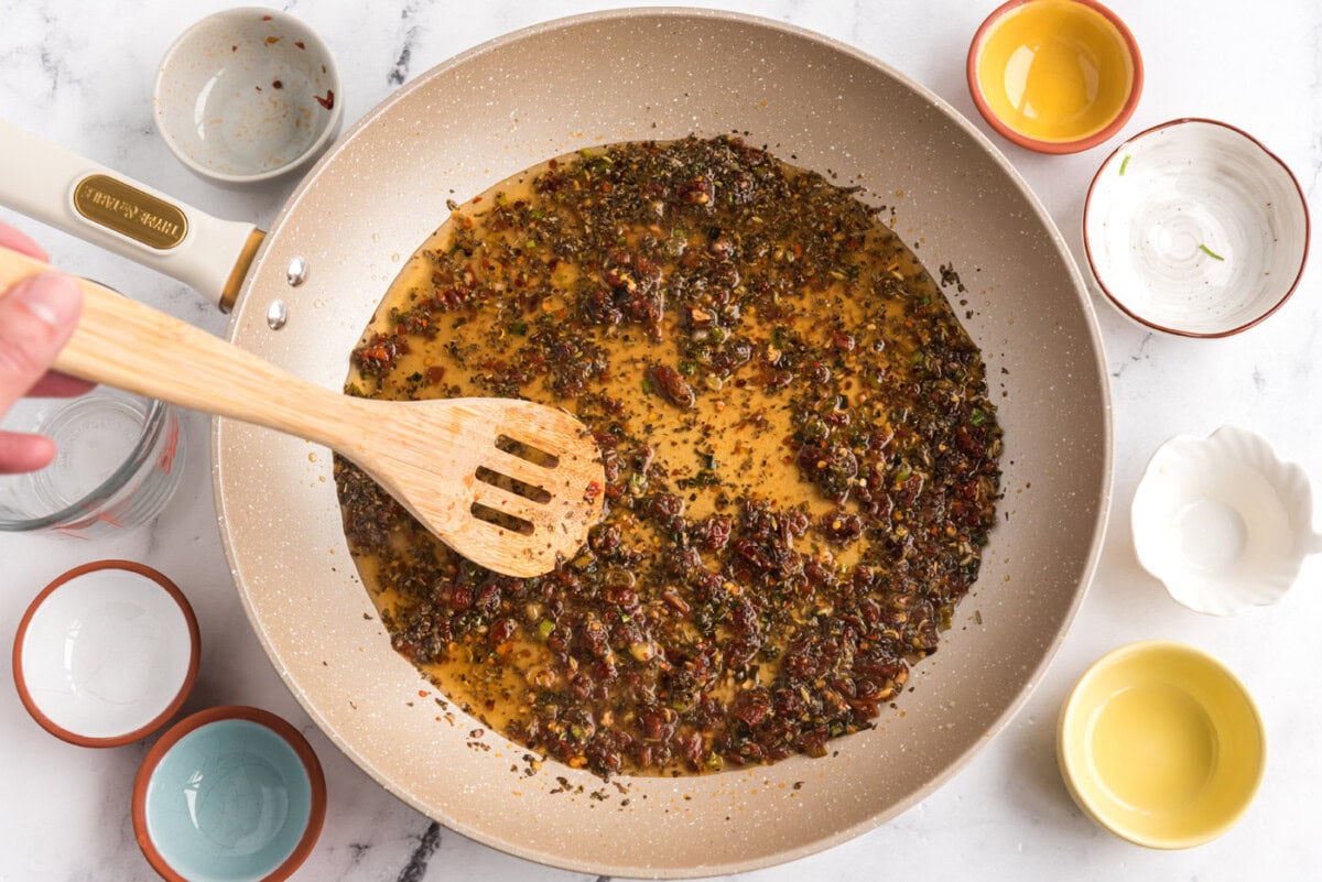 simmered sun dried tomato mixture in a skillet