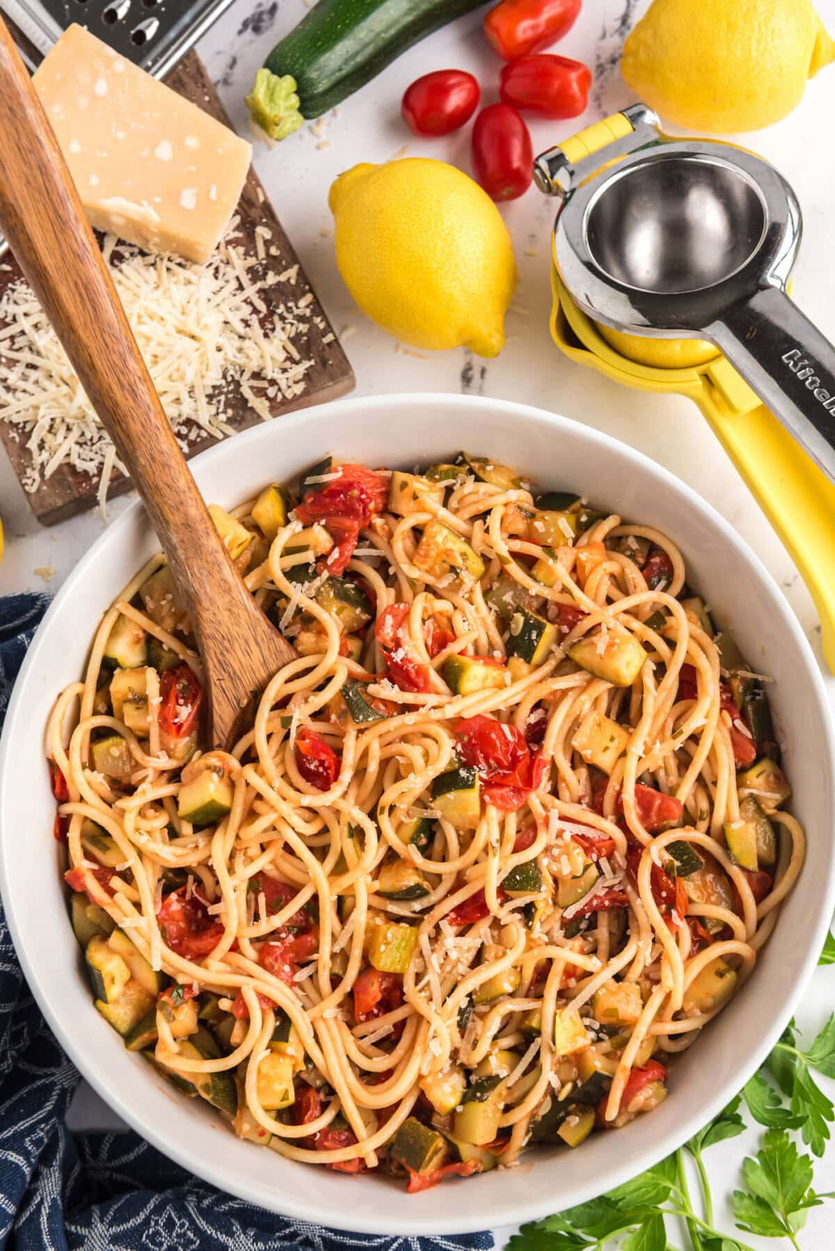 Bowl of Simple Zucchini Tomato Pasta with a spoon in it