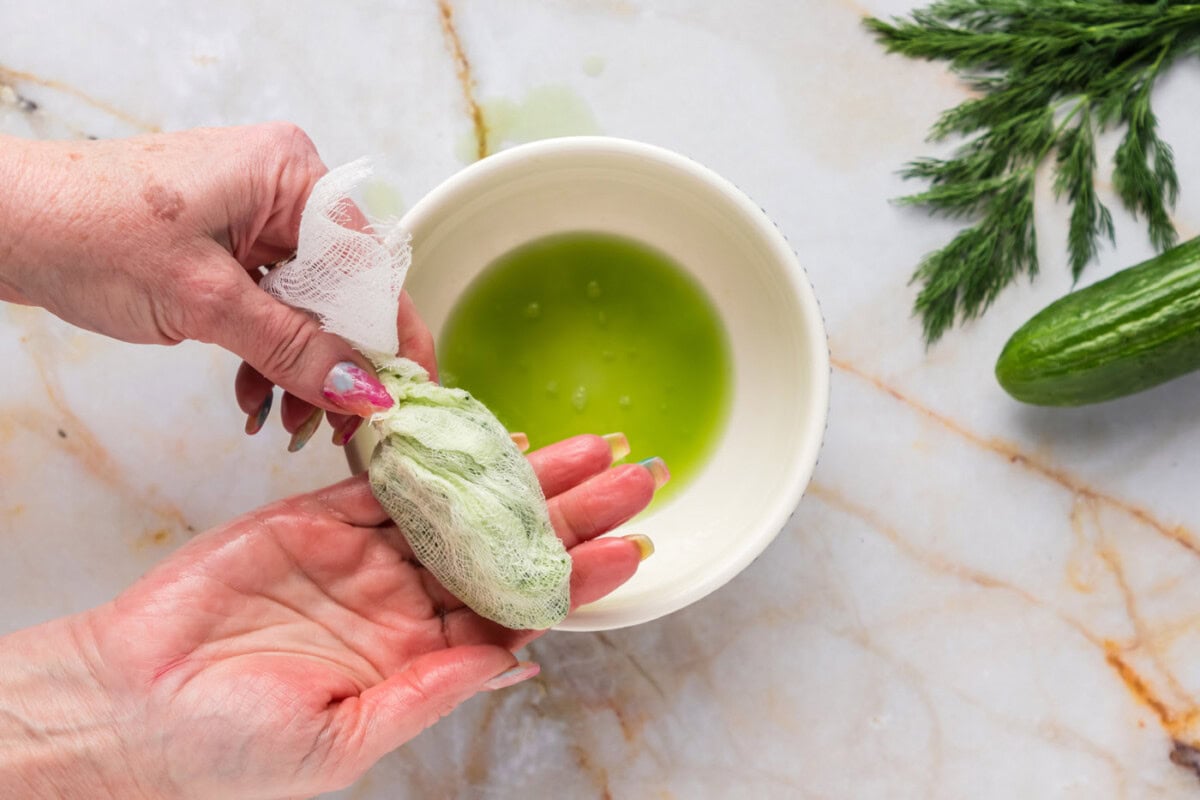 shredded cucumber squeezed of its juices in a cheesecloth