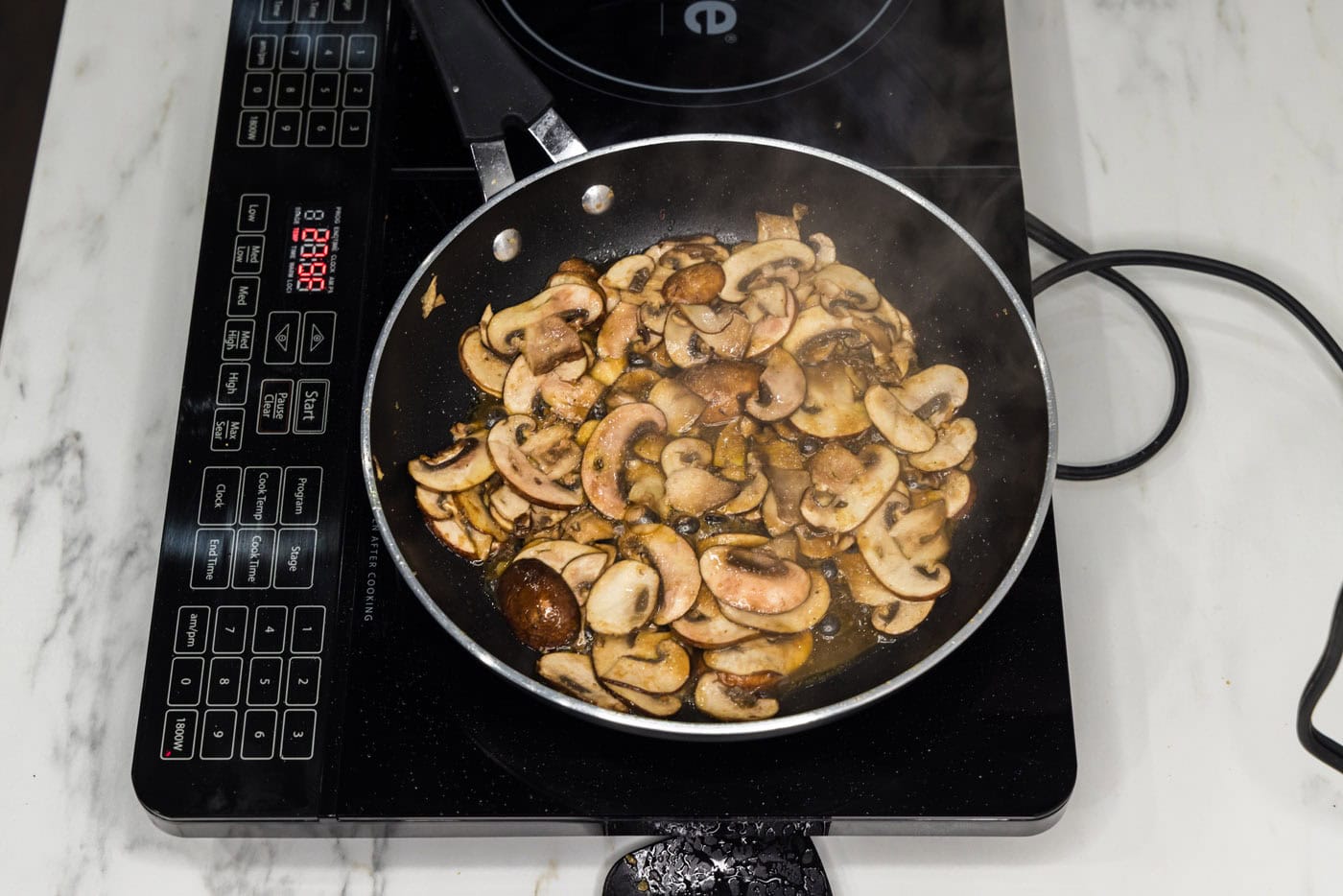 sauteed mushrooms in a skillet