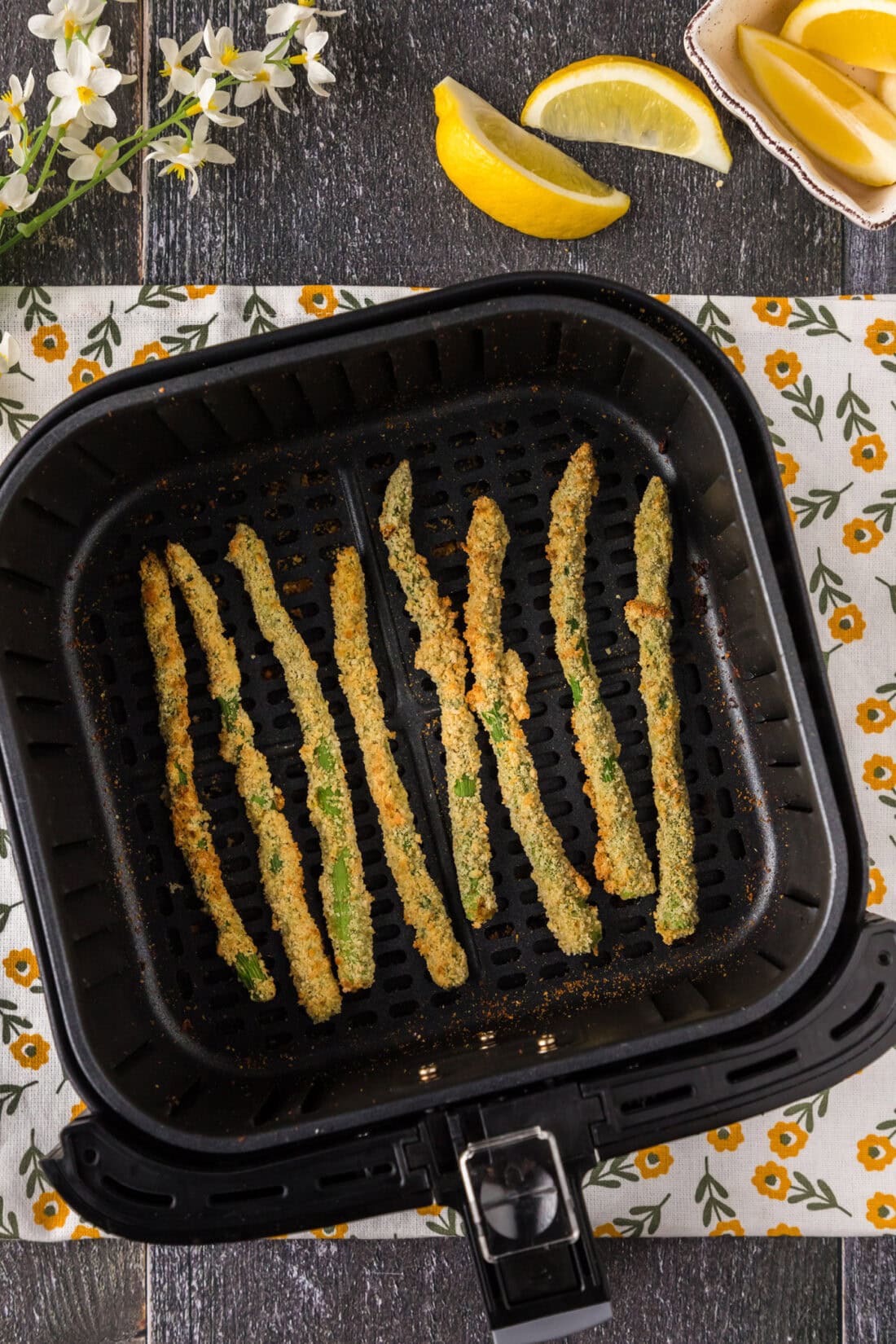 Air Fryer Fried Asparagus in an air fryer basket