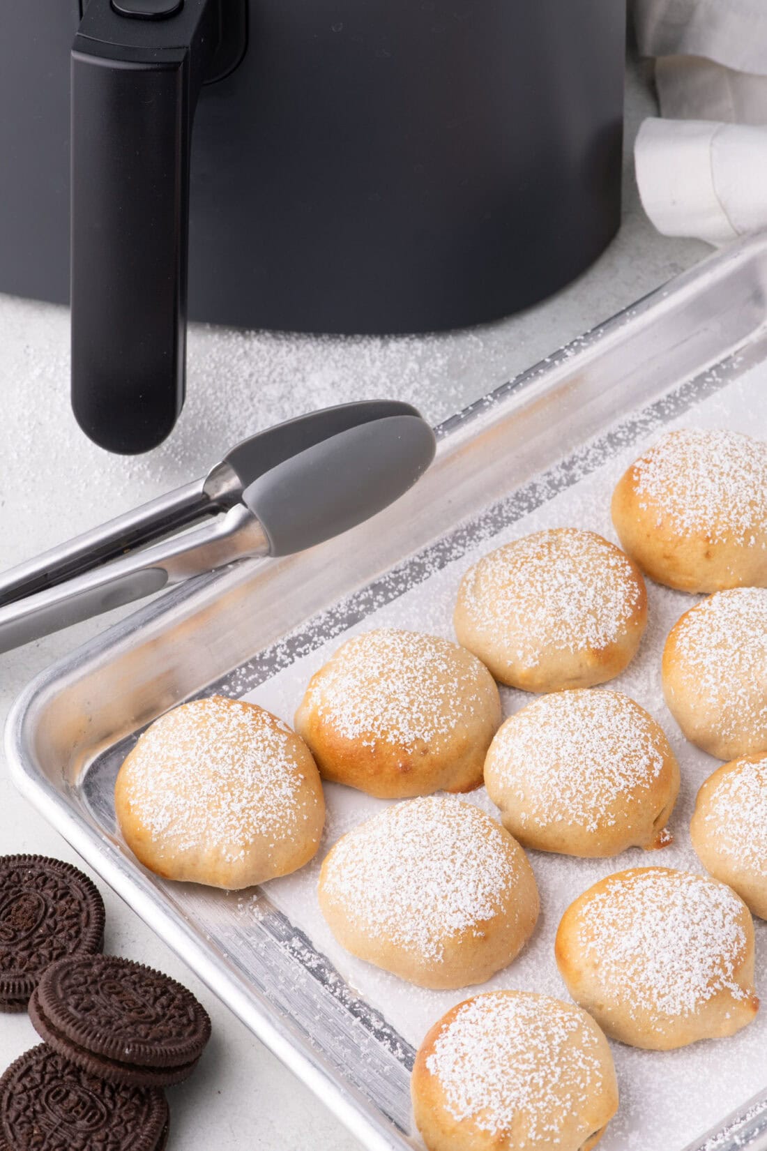 Air Fryer Oreos on a parchment lined baking sheet