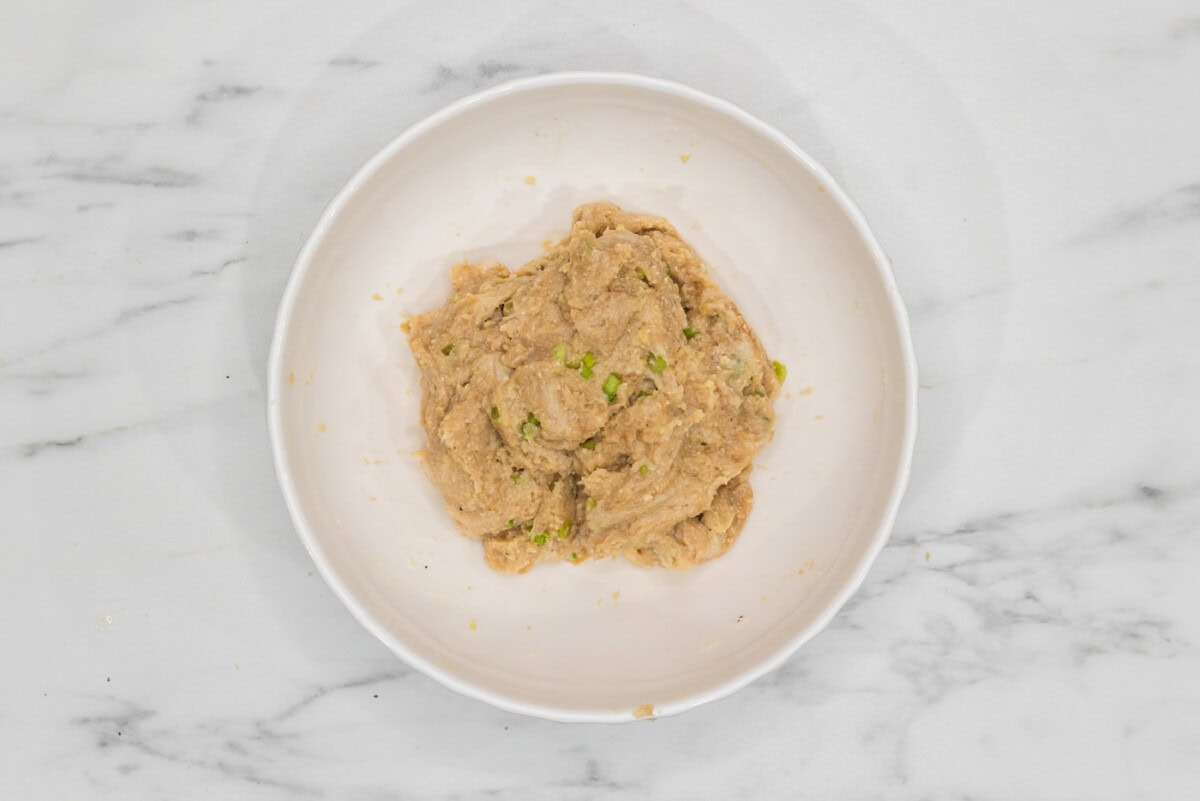 Asian chicken meatball mixture in a bowl
