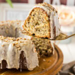 Slice of Banana Bundt Cake held up on a pie server