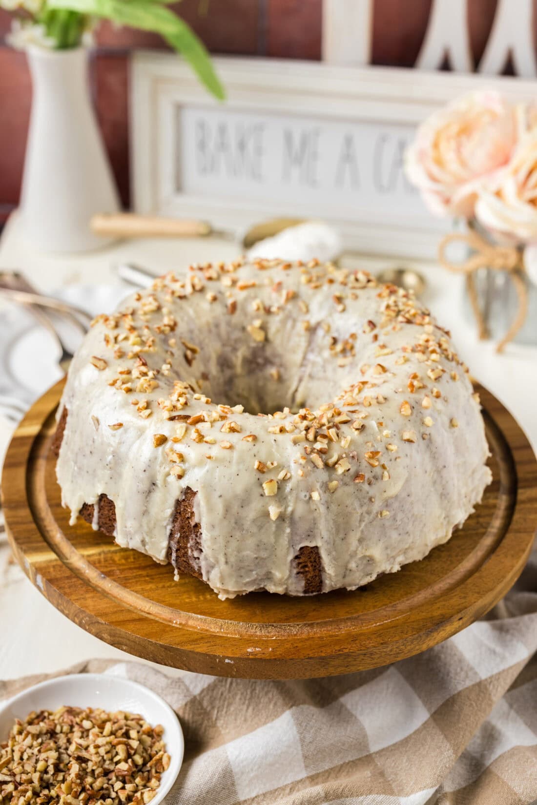 Banana Bundt Cake on a wooden cake stand