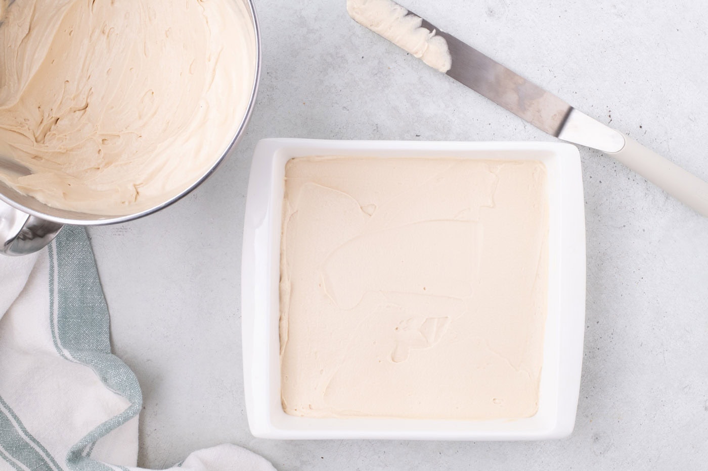 Biscoff cream cheese mixture in a baking dish