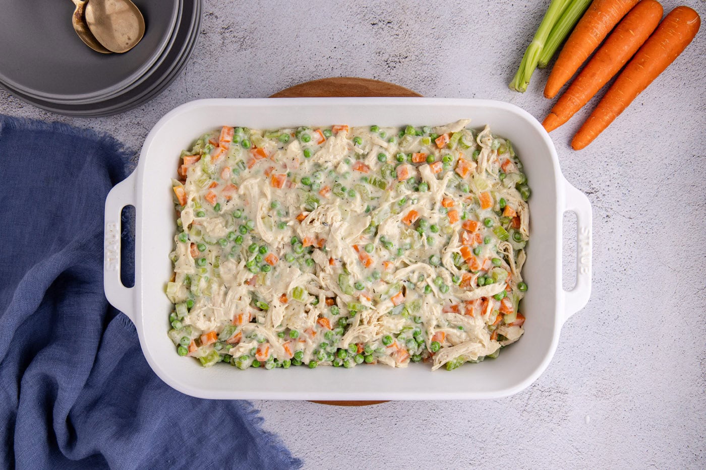 chicken pot pie filling in a casserole dish