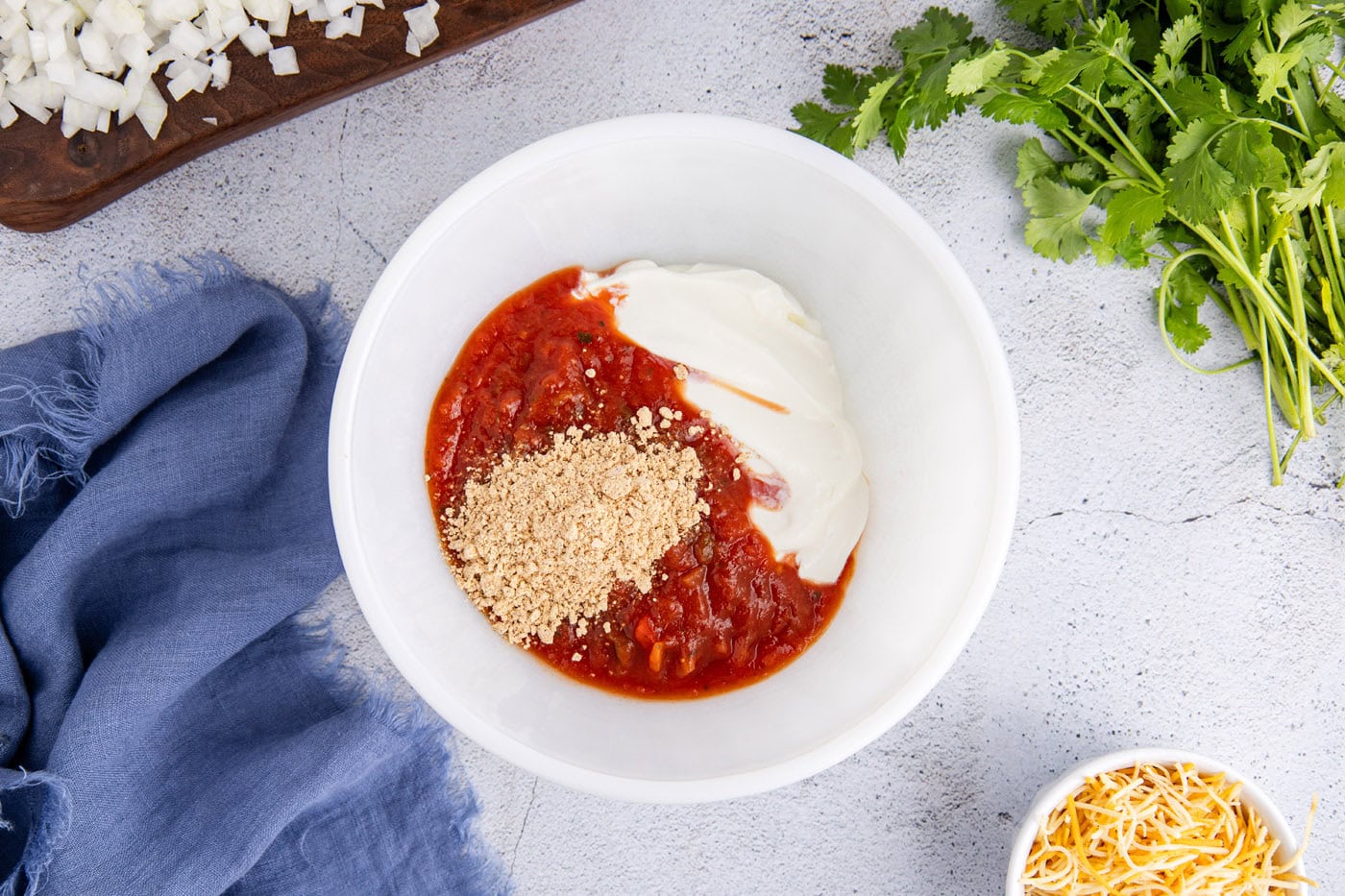 salsa, sour cream, and taco seasoning in a bowl