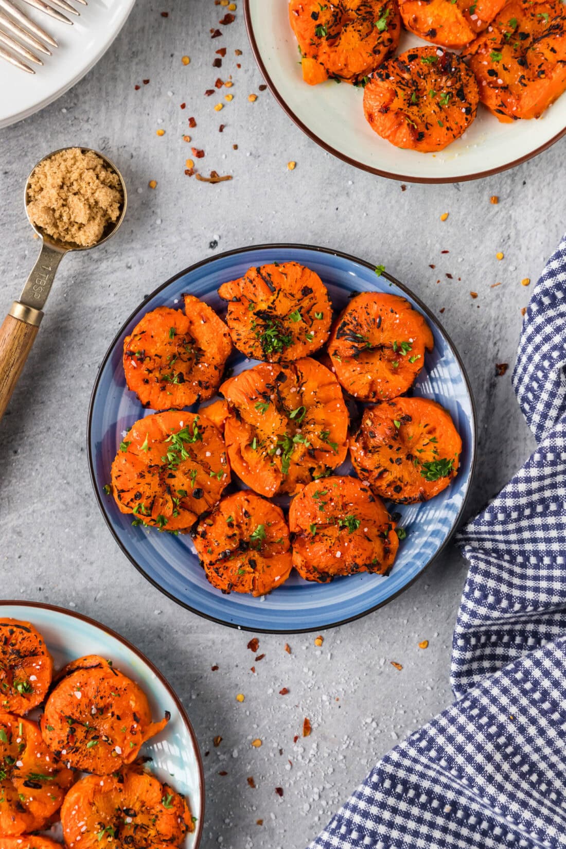 Smashed Carrots on a blue plate