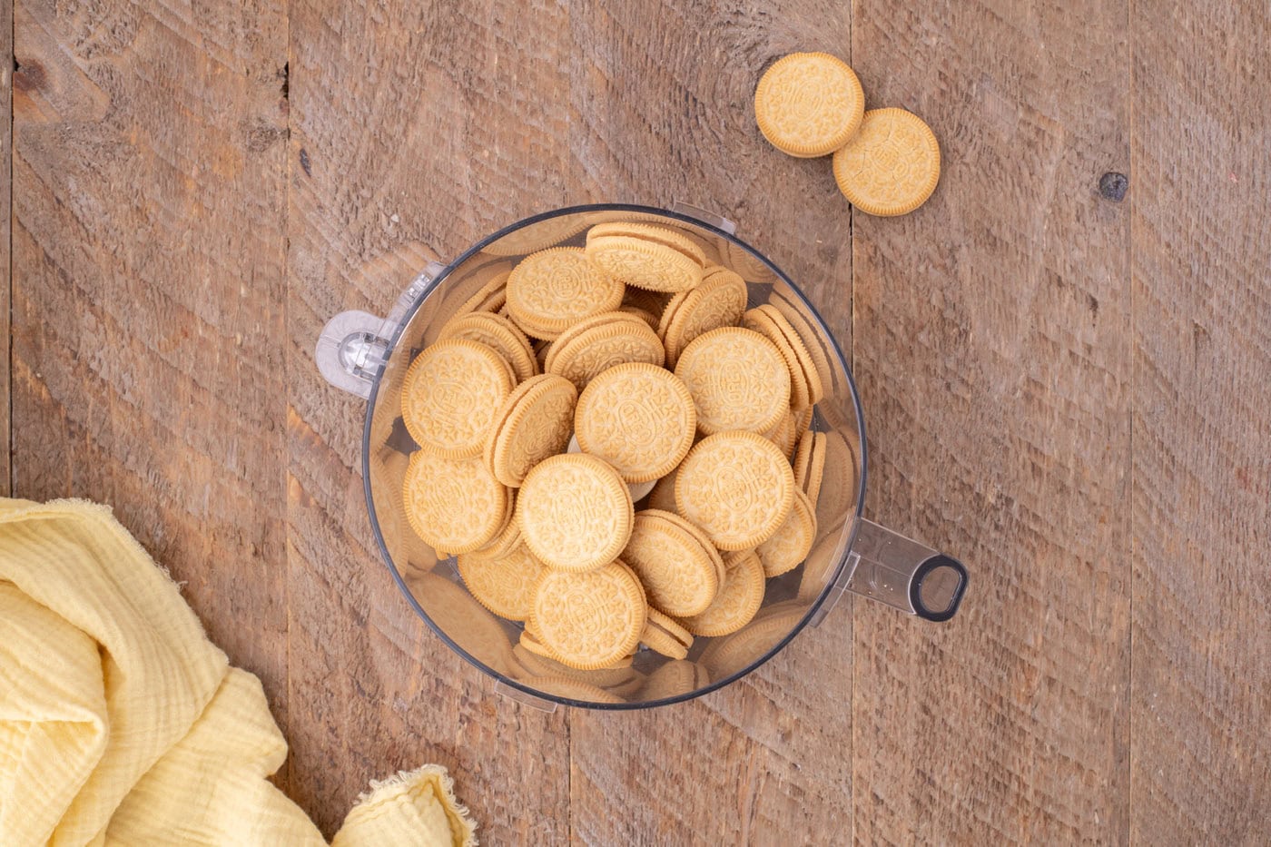 golden oreos in a food processor bowl