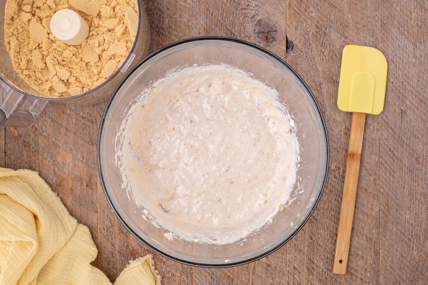 mashed bananas and cream cheese mixture in a bowl