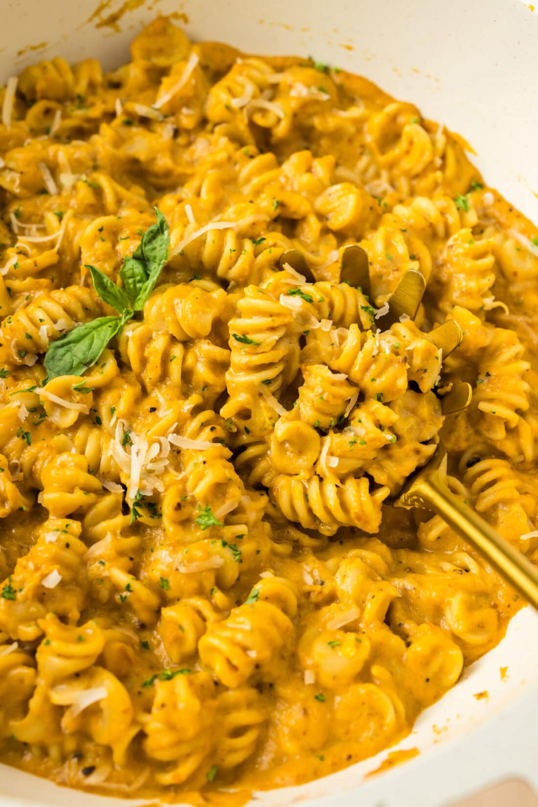 Close up photo of Butternut Squash Pasta in a skillet with a spoon