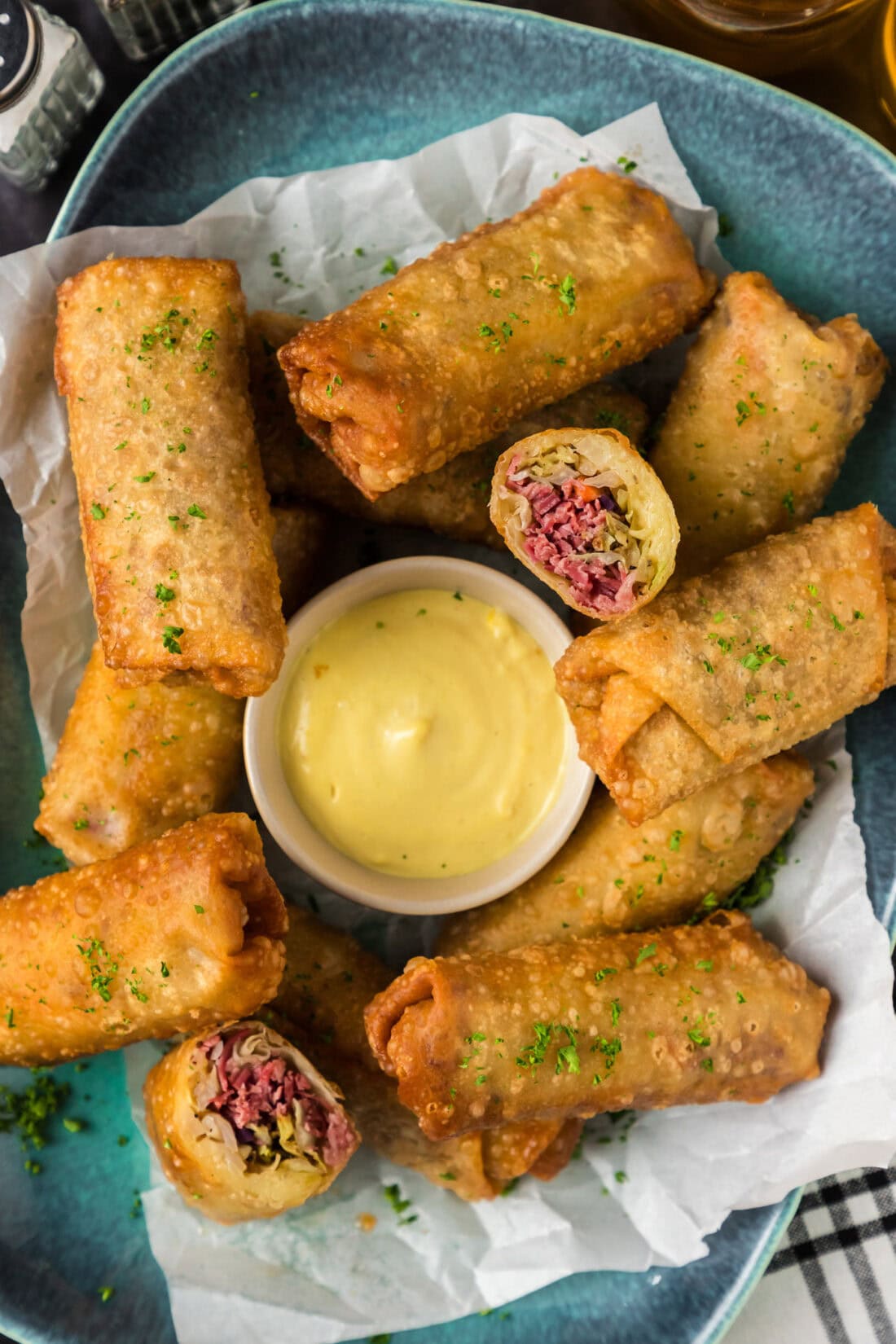 Platter of Corned Beef Egg Rolls with one cut in half