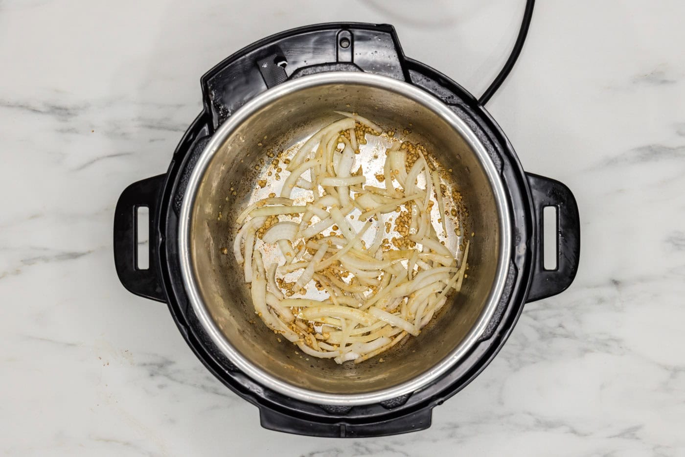 sauteeing onions and garlic in the instant pot