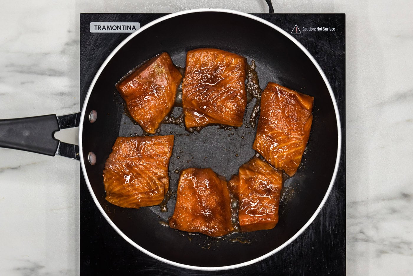 pan searing marinated salmon slices