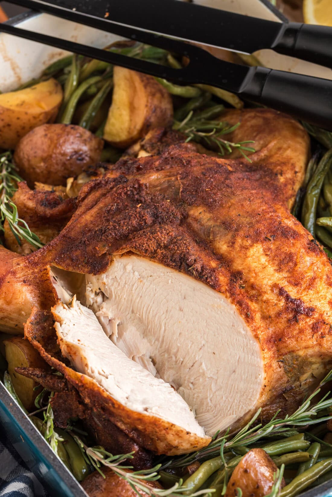 Close up photo of Slow Roasted Sticky Chicken cut apart