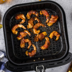 Air Fryer Bacon Wrapped Shrimp in an air fryer