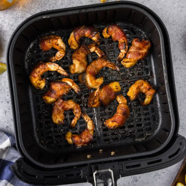 Air Fryer Bacon Wrapped Shrimp in an air fryer